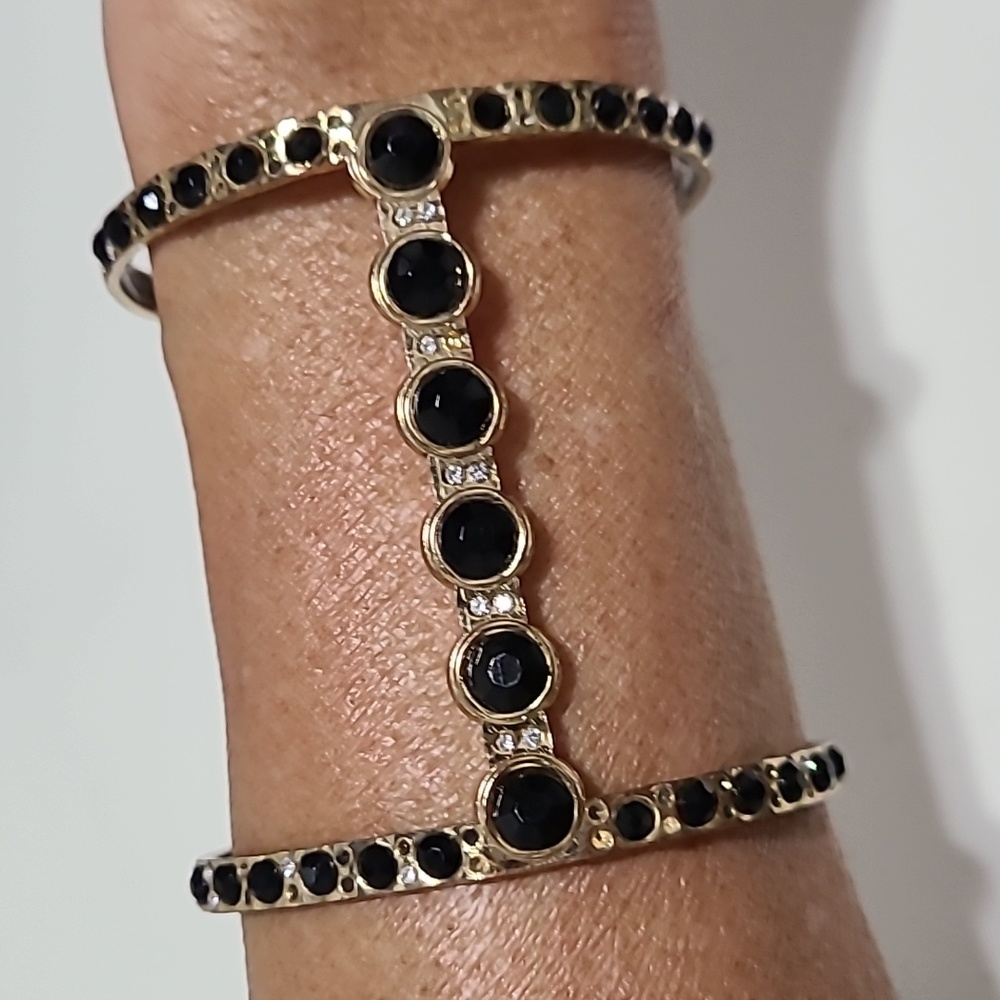 None Gold Tone bracelet Black Stones